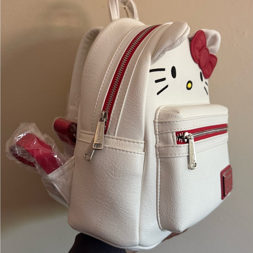 Hello Kitty White and Red Mini Backpack with Bow Accent by Loungefly